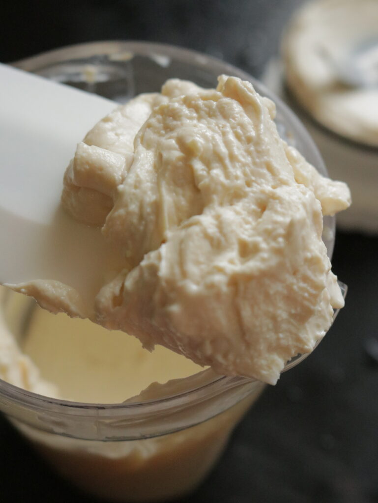homemade cream cheese in a spoon