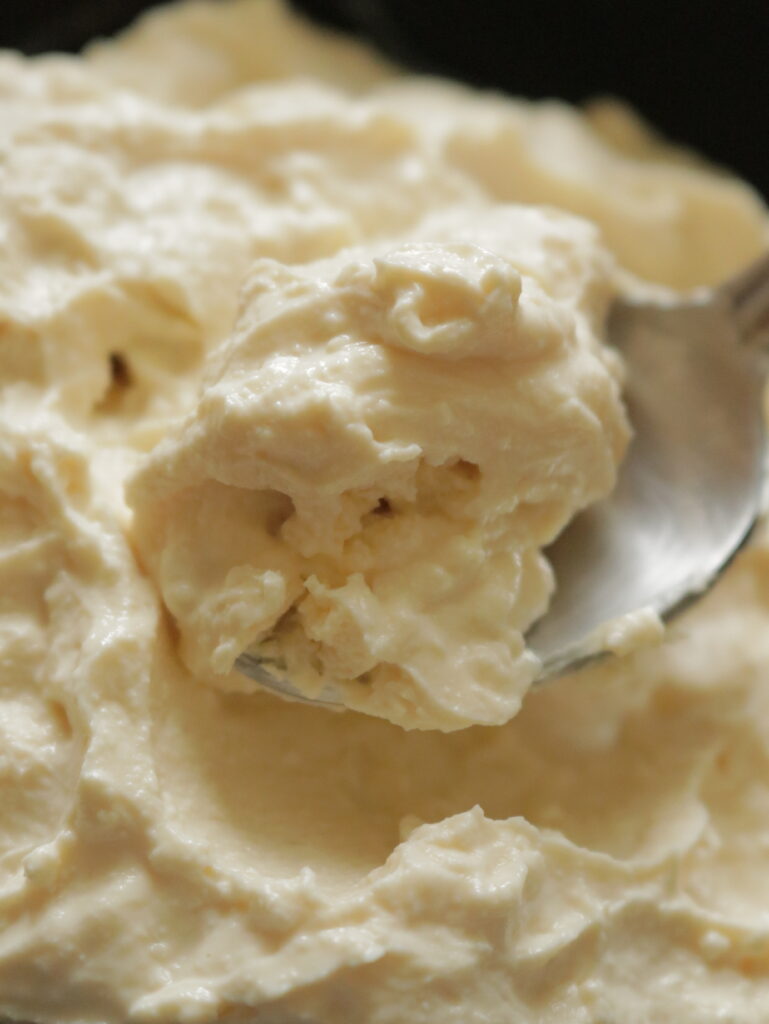 a spoon of cream cheese.