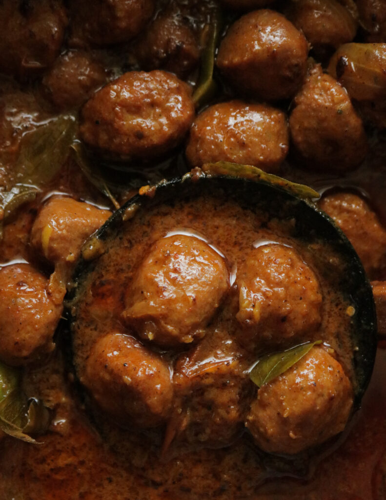 chicken meatballs made with coconut milk and spices.