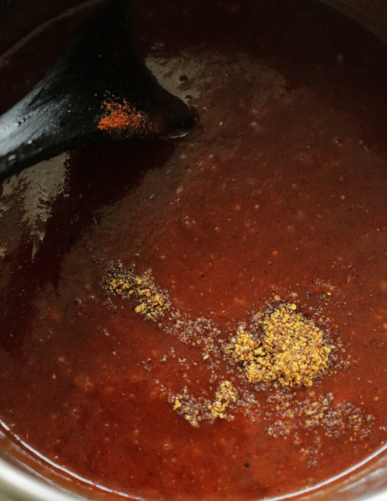 adding mustard powder to the BBQ sauce.