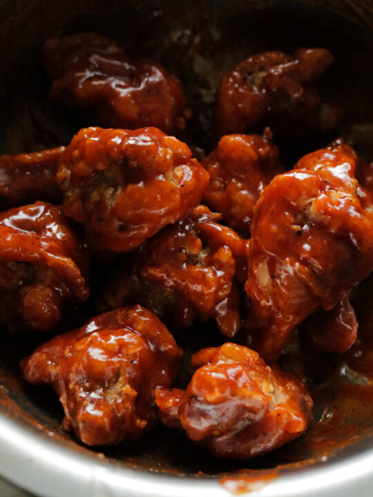 Fried chicken wings in bbq sauce. ISLAND SMILE