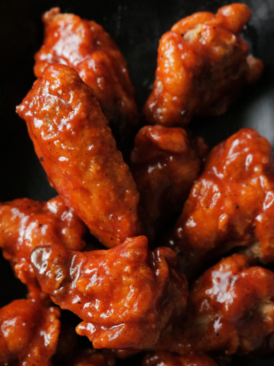 Fried chicken wings in bbq sauce. ISLAND SMILE