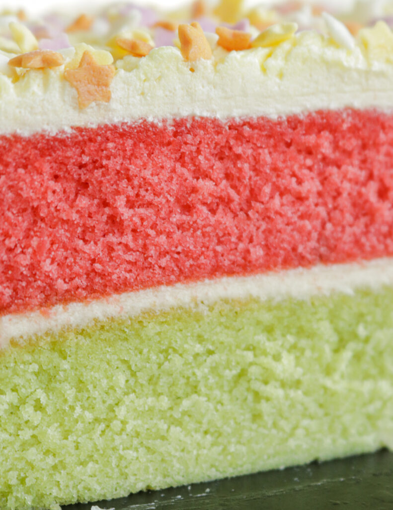pink and green layers of the ribbon cake