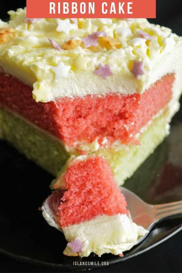 ribbon cake with butter cream frosting with star sprinkles