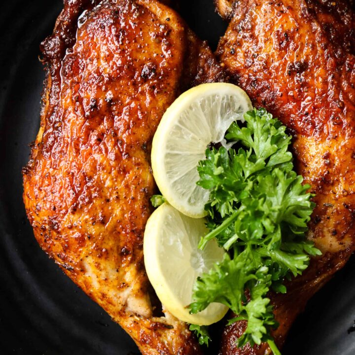 air fryer chicken leg quarters with lime wedges