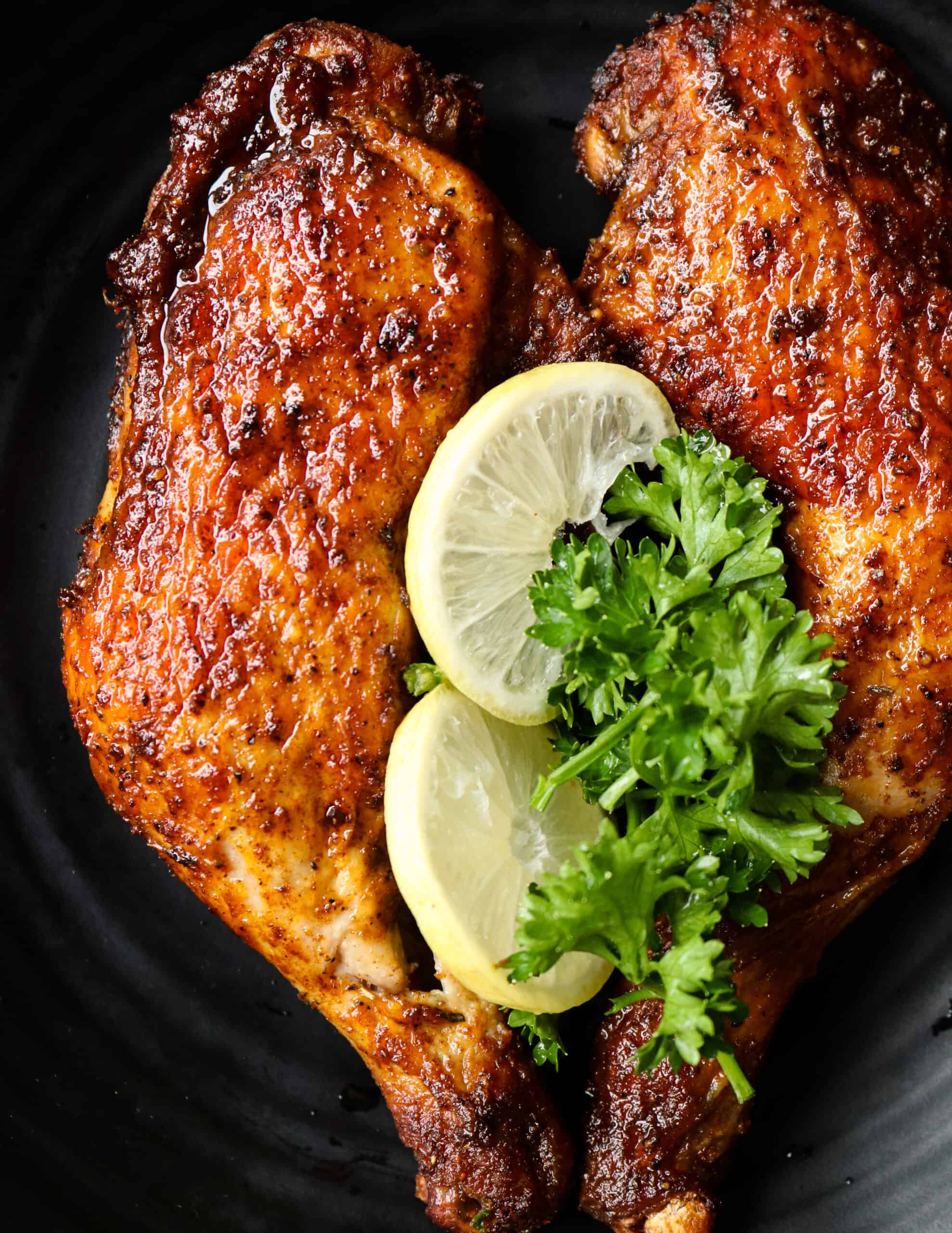 air fryer chicken leg quarters with lime wedges