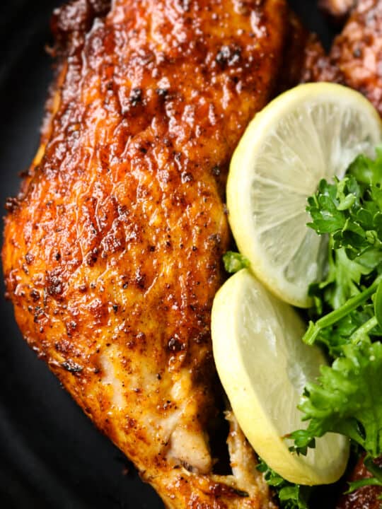 air fryer chicken leg quarters with lime wedges