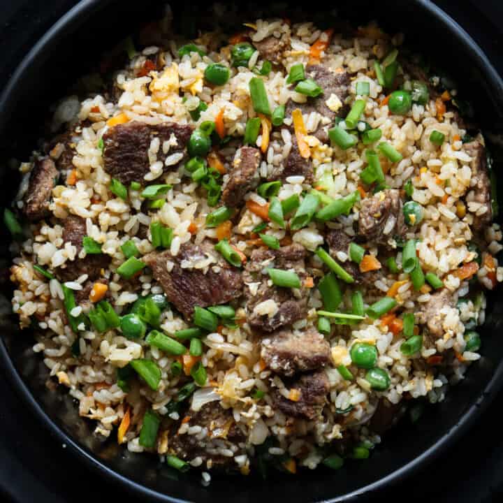 easy beef fried rice served in a back bowl.