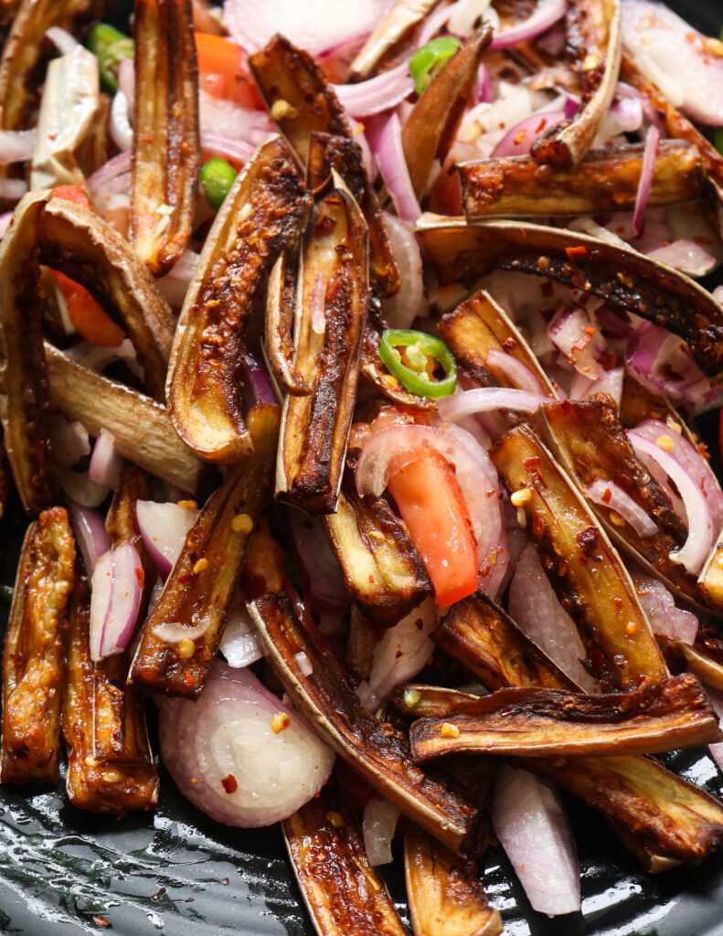 mixed fried eggplant salad served on 
