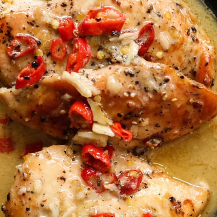 lemon chicken with chillies garnishing the chicken breasts