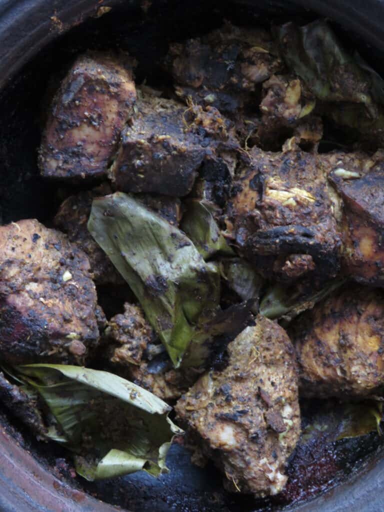 ambulthiyal cooked in banana leaf and in a clay pot