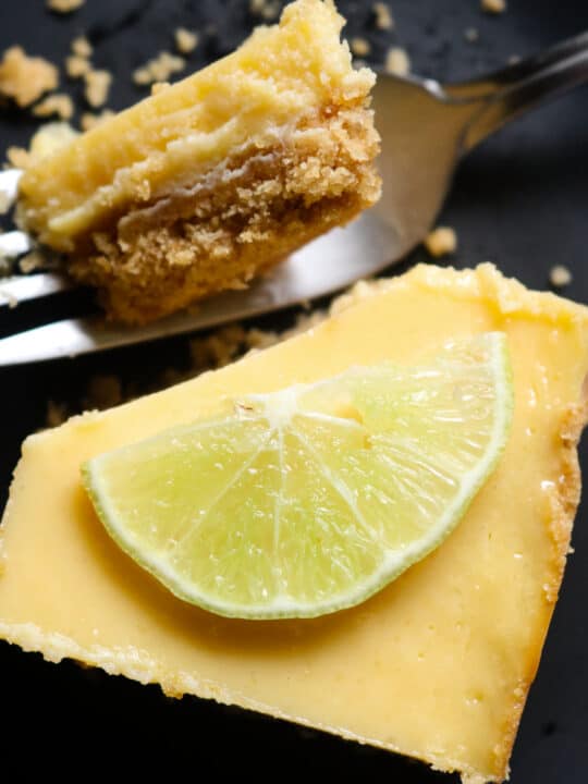 easy key lime bars served on a plate.