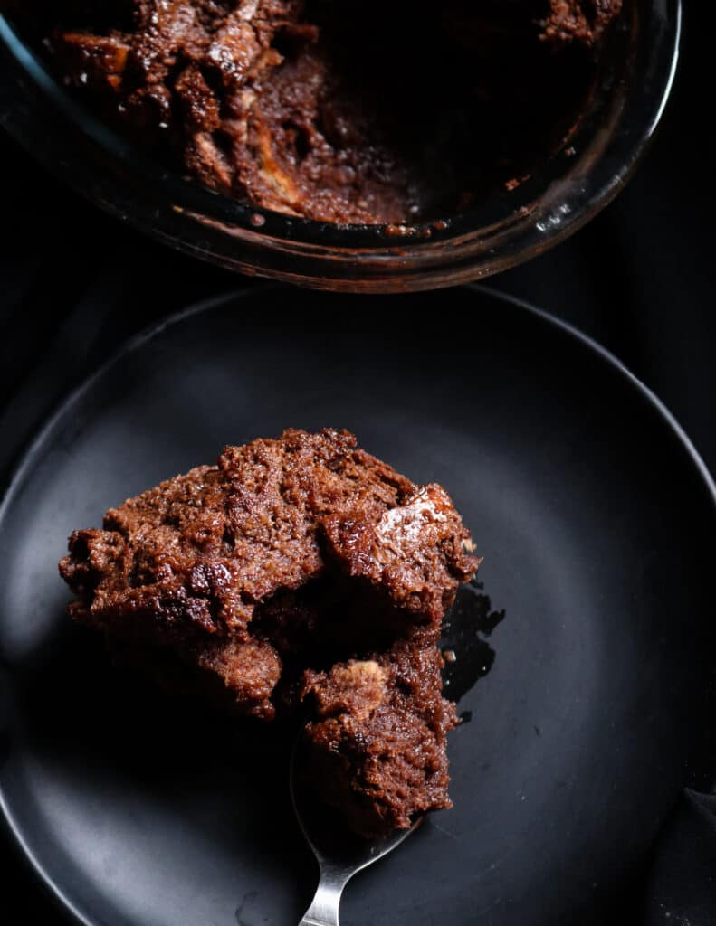 chocolate bread pudding served on a plate.