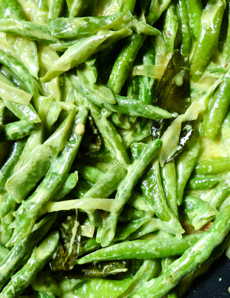 sri lankan long bean curry cooked in coconut milk and spices.