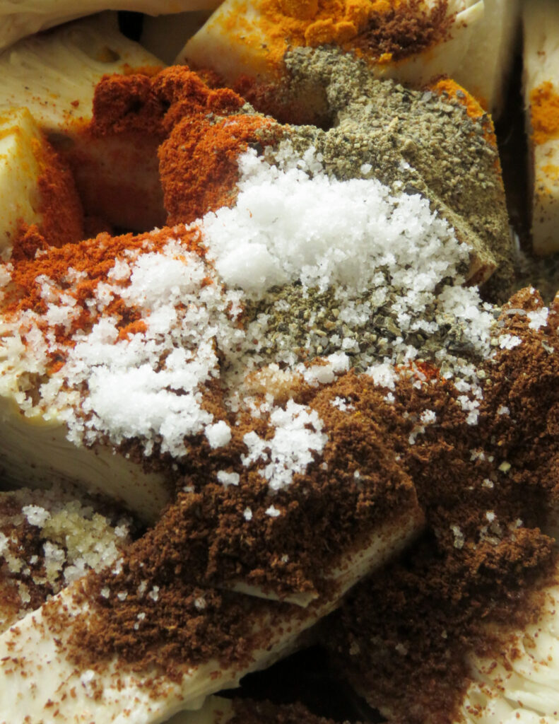 salt, curry powder, red chilli powder added to the baby jackfruit cubes.