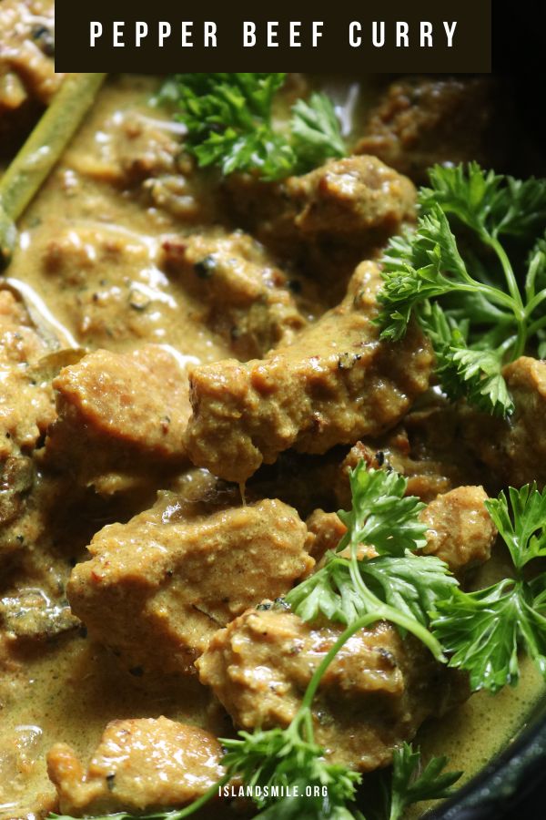 black pepper beef curry with a parsley garnish.