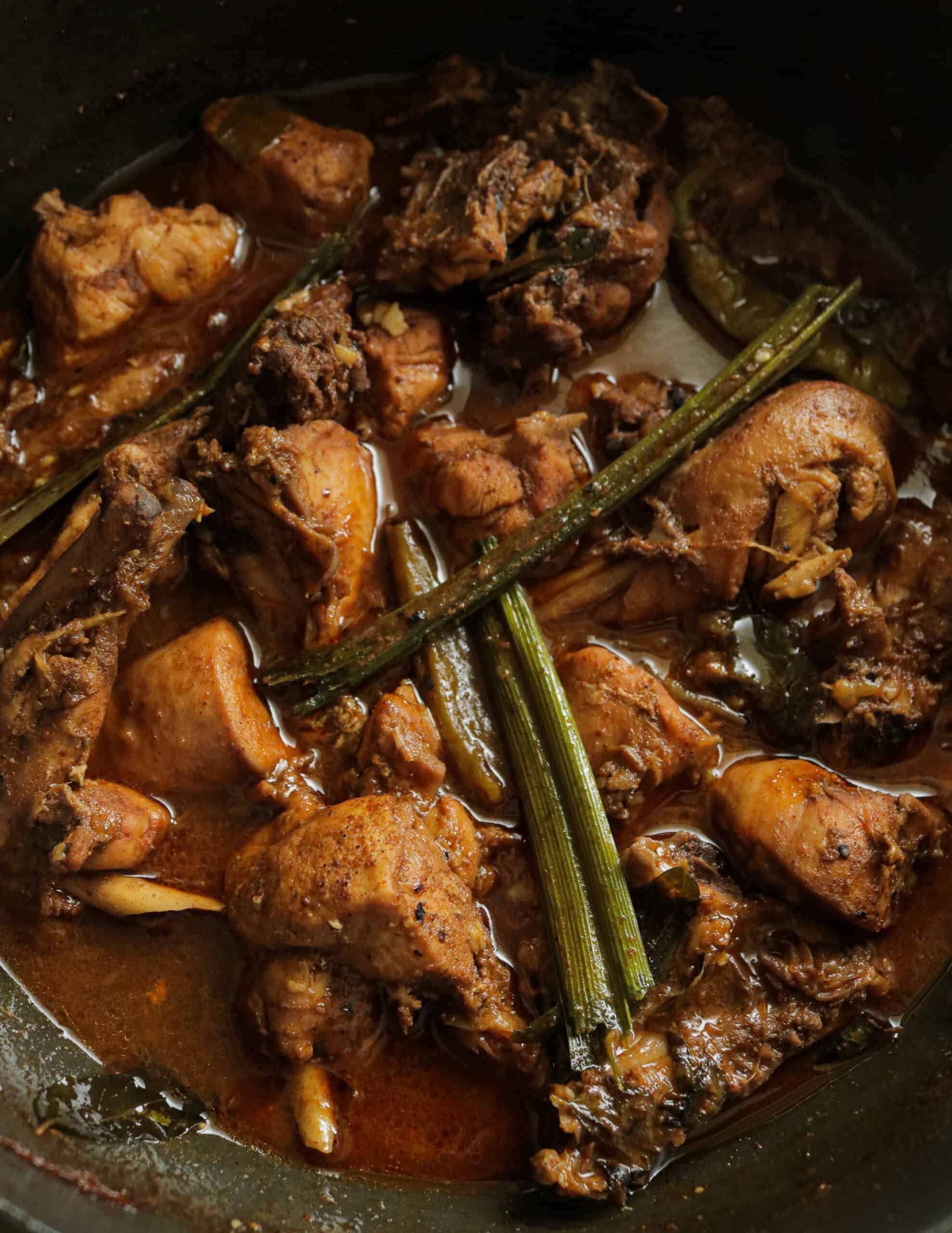 jaffna curry powder chicken curry cooked in a pot.