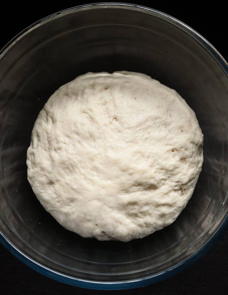 dough in a bow gently rising.