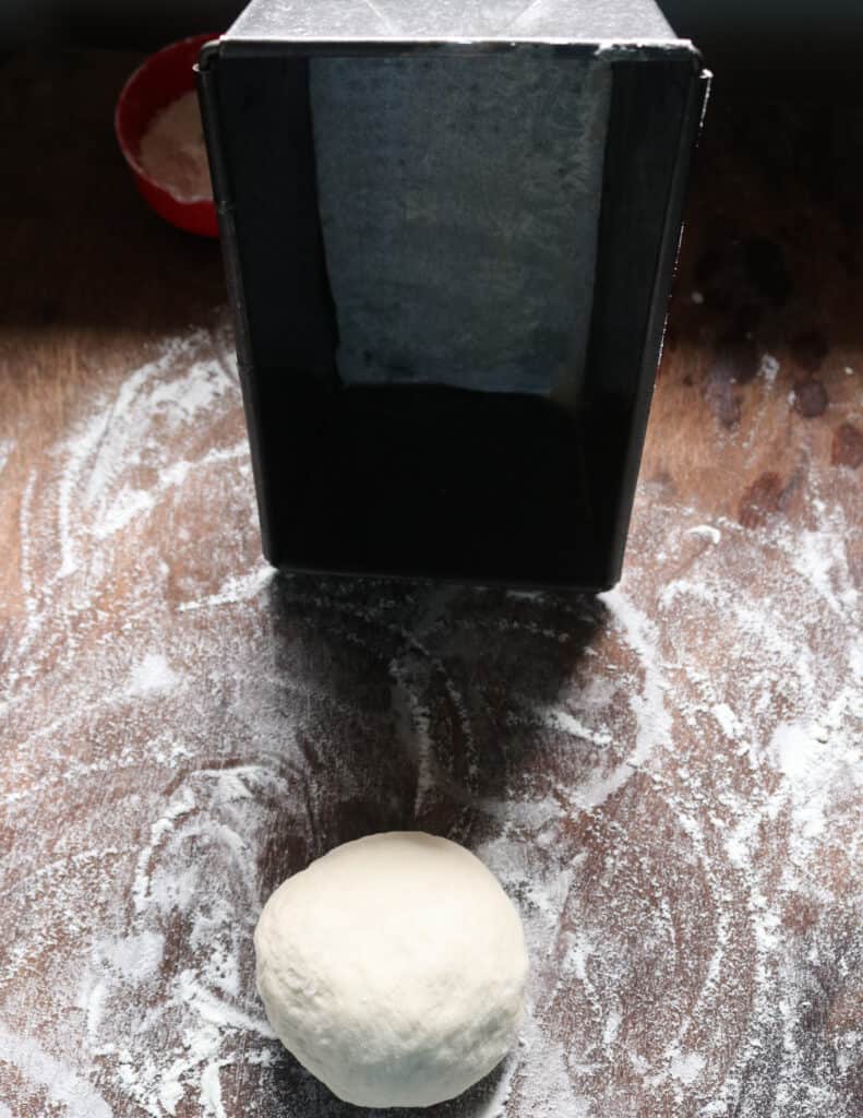 keeping the loaf pan to roll out the roast paan.