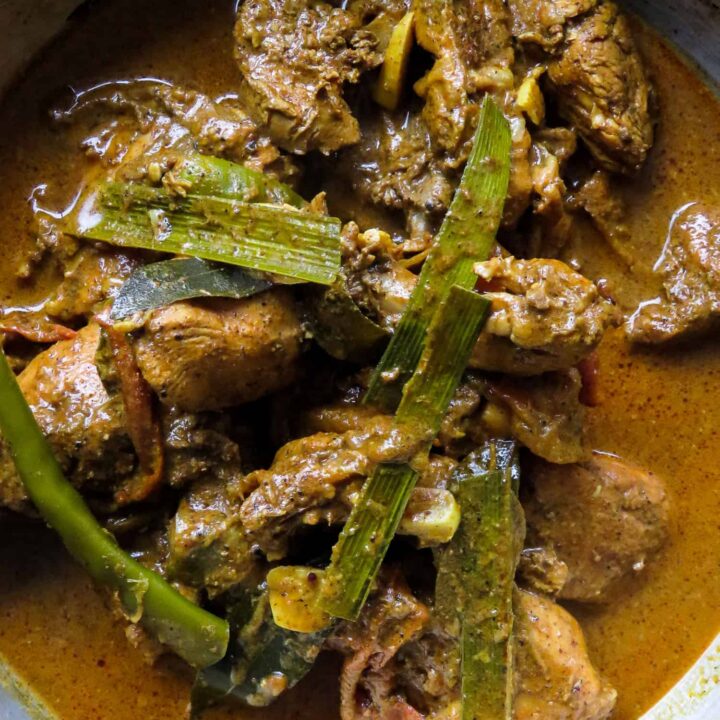 jaffna chicken curry cooked with spicy curry powder.