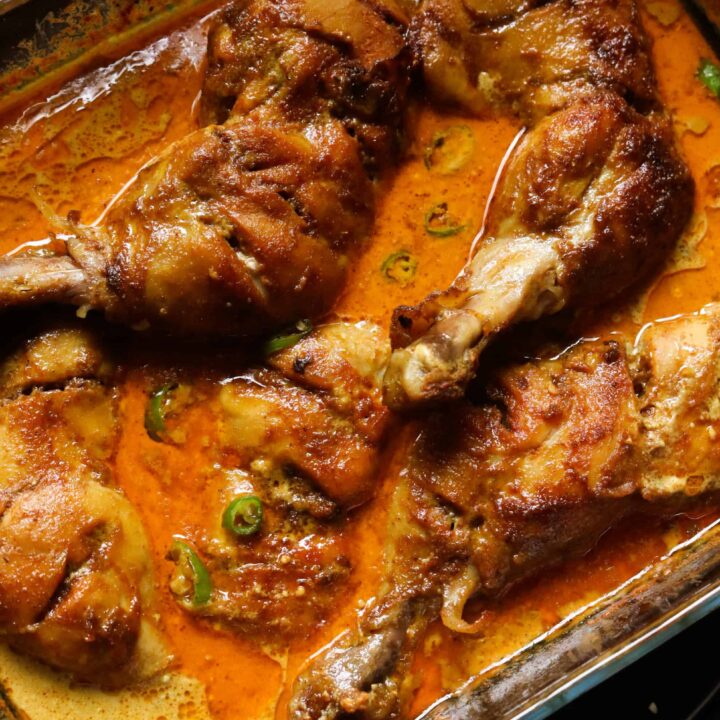 baked curry chicken served in a dish.