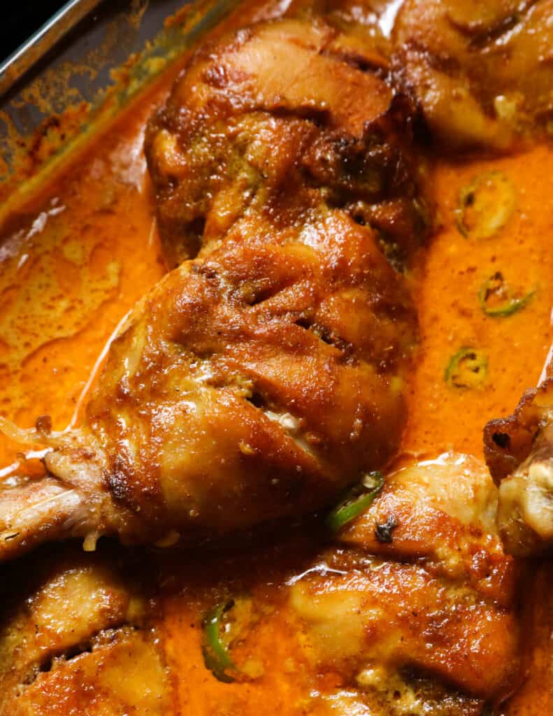 baked curry chicken quarters with a juicy gravy