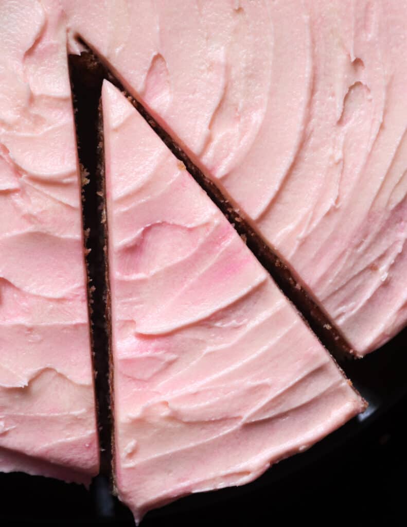 pink marble cake or neopolitan sigle layer cake with pink swirl frosting.