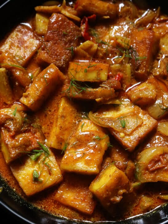 easy paneer curry cooked and served in a bowl.