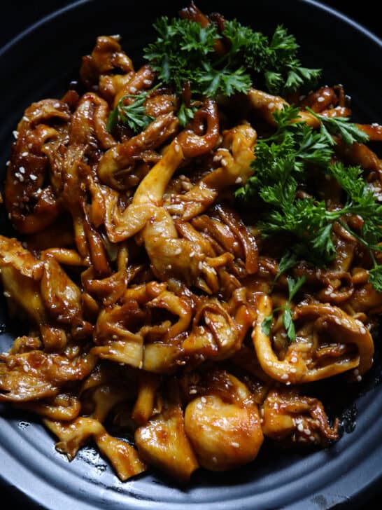 teriyaki mushroom stir fry served in a platter