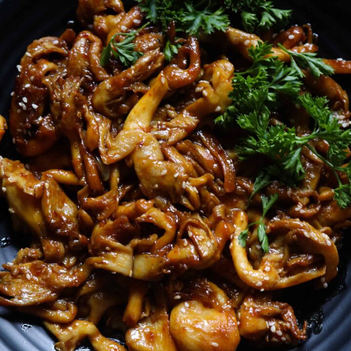 teriyaki mushroom stir fry served in a platter