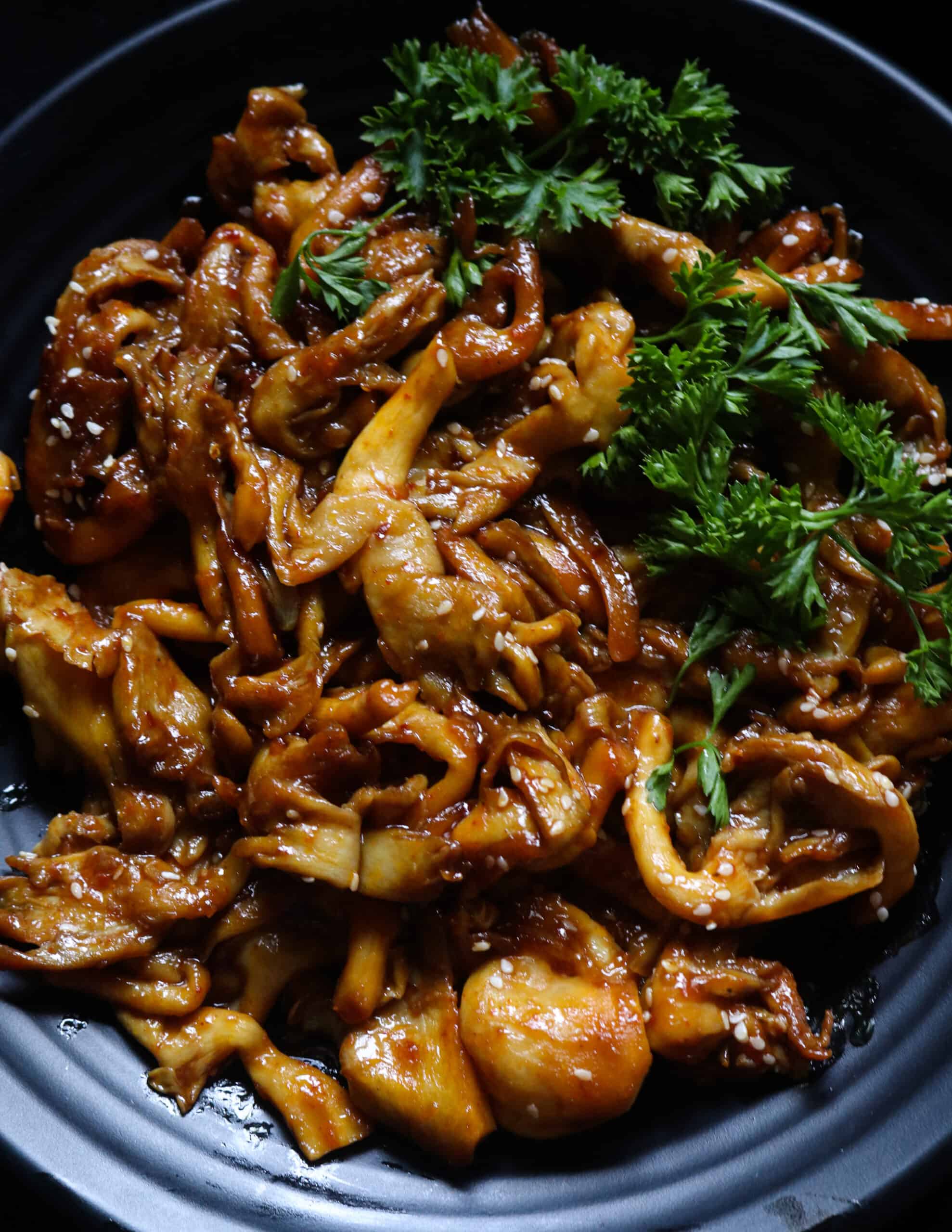 teriyaki mushroom stir fry served in a platter