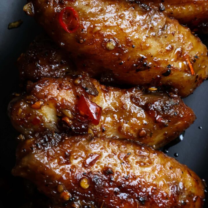 close up of sweet and spicy crispy chicken wings.