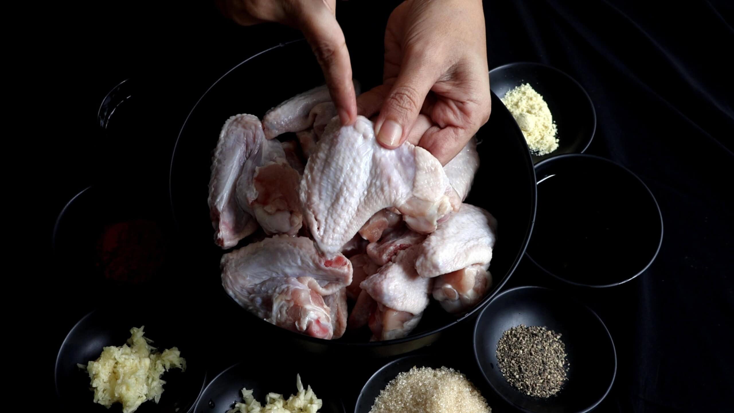 Keeping the wings intact to make the sweet andpicy chicken wings.