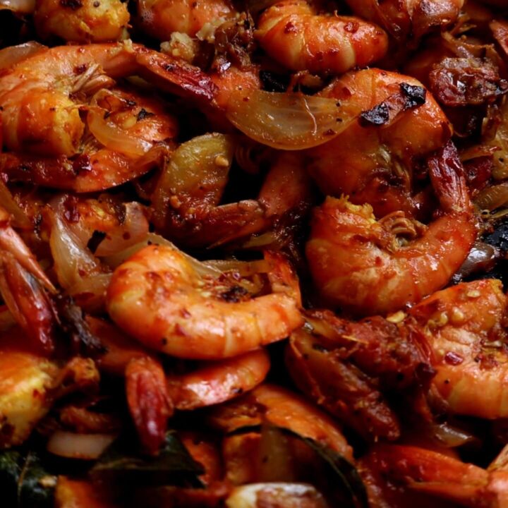 spicy prawn stir fry cooked over a stove top