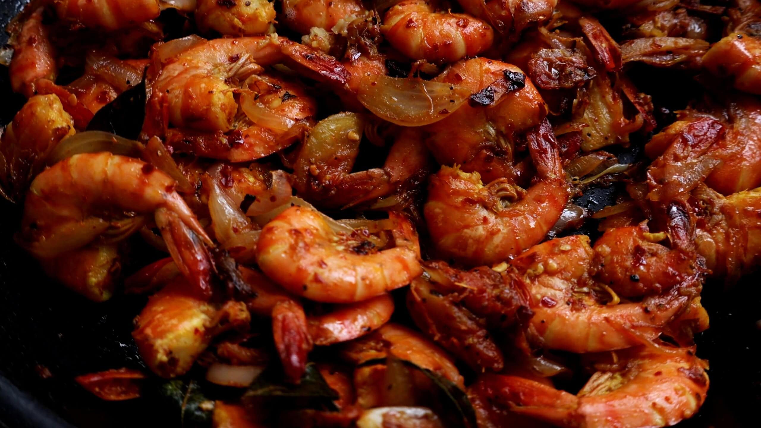 spicy prawn stir fry cooked and ready to be served.